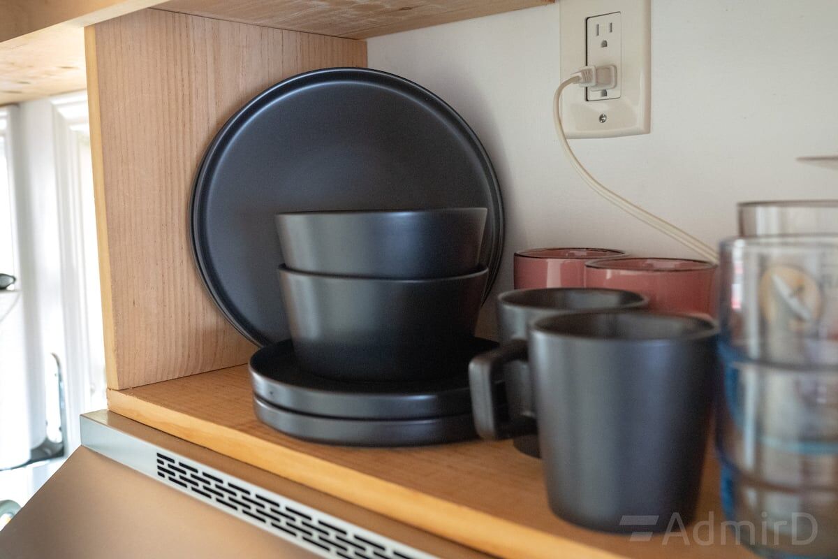 Dishes and cups in the Houston Tiny House kitchen